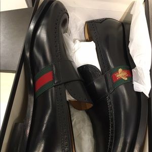 Black Gucci penny loafer